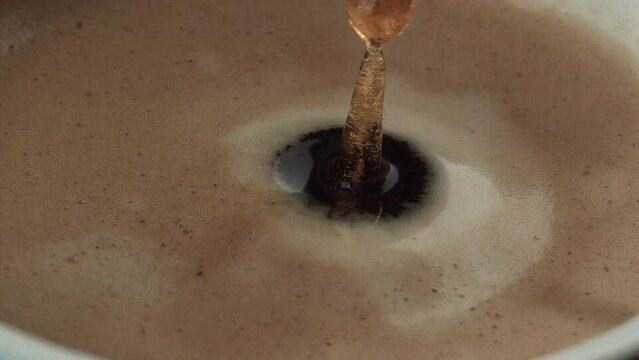 Coffee Drop in Mug: Super Slow-Mo 1000fps Discover mesmerizing coffee droplets in super slow motion (1000fps). Ideal for coffee enthusiasts, creatives, and unique projects.