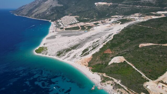 Palasa Beach Bliss: Albanian Coastal Paradise with Deep Blue Sea, Mountain Resort Villages, Luxurious Villas - A Haven for Tourism and Real Estate