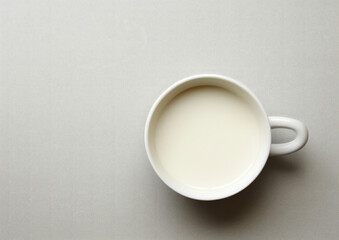 A cup of milk on a table