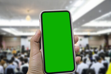 Point of View of Woman at Phone with Green Screen for Copy Space. The concept of a successful business woman, feminism. Close-up.