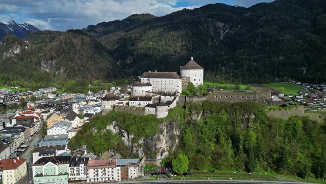 Aerial around view of Kufstein town with medieval Castle fortress in Tyrol, Austria, Alps mountains, 4k