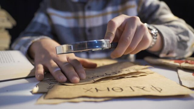 A historian who researches written language in ancient times.