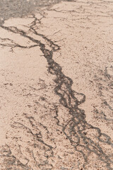 Abstract relief rough gritty neutral beige surface of background texture. Aesthetic pattern on sandstone. Top view textured sand, natural ornament or wallpaper, macro photo shore salt lake