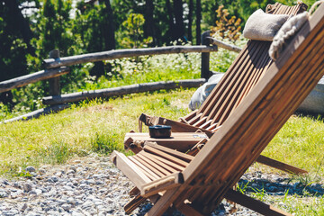 Two wooden chairs with mountain view at mountain resort in Swizzera. Vacation, travel and trip...