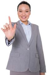 Digital png photo of happy asian businesswoman pointing with finger on transparent background