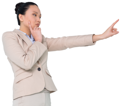 Digital png photo of serious asian businesswoman pointing with finger on transparent background
