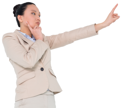 Digital png photo of serious asian businesswoman pointing finger on transparent background