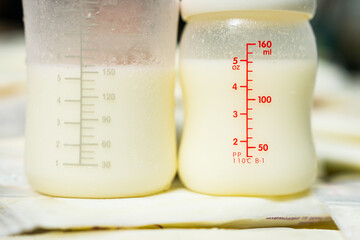 Breast milk storage bags, Bottles and Frozen breast milk for new baby,  Breast Pumping milk concept. selective focus.