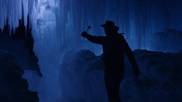 Cinematic Silhouette of Fire Breather In Ice Cavern - Slow Motion