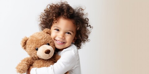 child hugs a bear doll on a white background, generative AI - obrazy, fototapety, plakaty