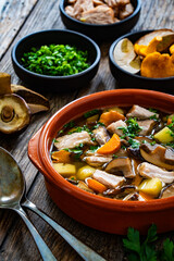 Mushroom soup on wooden table
