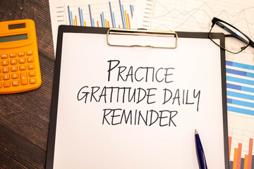 Practice gratitude daily reminder - inspirational handwriting on a napkin.
