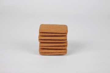 stacked chocolate biscuits isolated on white background