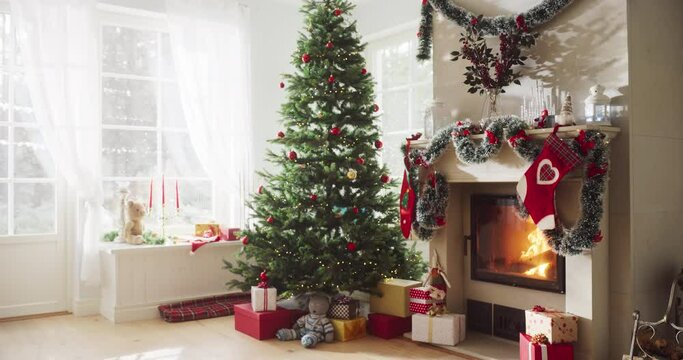 Empty Shot Depicting the Magic of Holidays on a Peaceful Snowy Christmas Morning: Decorated Corner in Modern House with Christmas Tree, Fireplace and Gifts. Home of a Family Celebrating with Joy