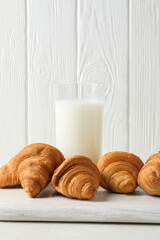 Breakfast tasty food concept - milk with bakery products