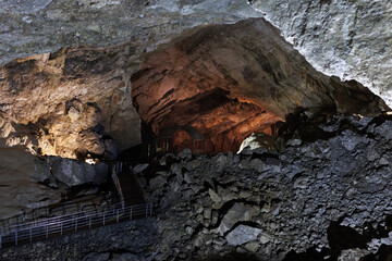 Stalactites, stalagmites from minerals in a mountain cave.