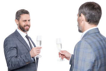 partnership and business success. businessmen isolated on white. successful business partnership. two successful businessmen partner celebrating business success with champagne glass