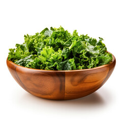 Fototapeta Chopped fresh kale salad in a wooden bowl isolated on a white background  obraz
