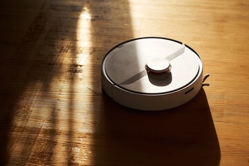 Modern Robotic Vacuum Cleaner for Smart Homes. Effortless Housekeeping. Smart Home Cleaning....