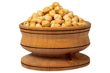 Roasted hazelnuts in wood bowl. Peeled hazelnuts kernel isolated on white background
