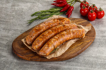 Raw sausages with spices and herbs