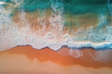 Fototapeta na wymiar Top view beautiful Waves on the sandy beach as a background.