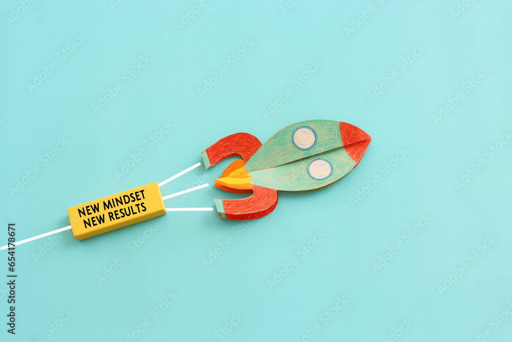 Aufkleber top view image of rocket with wooden cube and the text new mindset. success and personal development