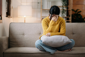 woman sit Depression Dark haired  pensive glance Standing by window and anxiety Copy space. at home