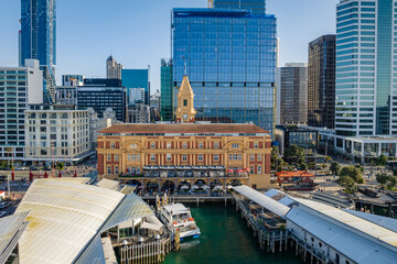Aerial: view of auckland city ferry terminal and waterfront , New Zealand - obrazy, fototapety, plakaty