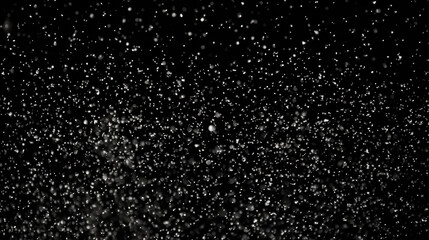 Snowflakes falling on a black background