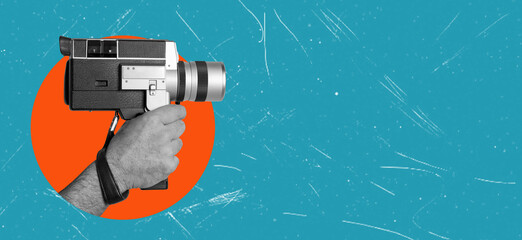 Modern art collage. image of a retro video camera in a person's hands, isolated on a blue...