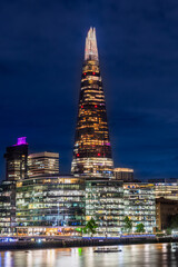 Skyline of London by night with big skyscraper