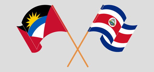 Crossed flags of Antigua and Barbuda and Costa Rica. Official colors. Correct proportion
