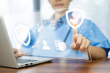 Doctor healthcare insurance concept. Doctor use computer screen medical insurance icon on global...