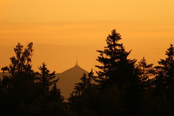 TV transmitter on Mount Ještěd at sunset