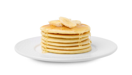 Delicious pancakes with banana slices and honey isolated on white