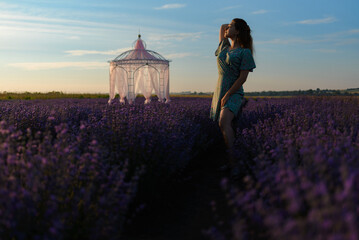 Silhouette of a woman in a lavender field
