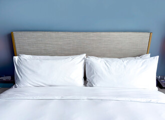 White cushion and white pillow as Modern bedroom interior with a stylish combination of trendy room interior