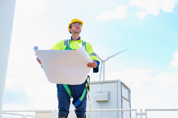 Technician engineer worker builders looking for wind turbine blueprint drawings for wind turbine...