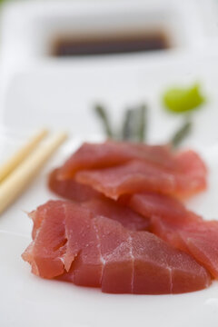 Plate of sushi with sliced tuna fish
