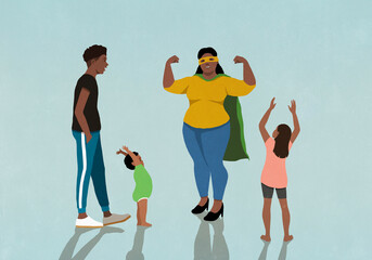 Family cheering for happy, confident mother in superhero cape and mask