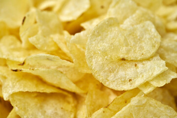 Extreme close up yellow potato chips
