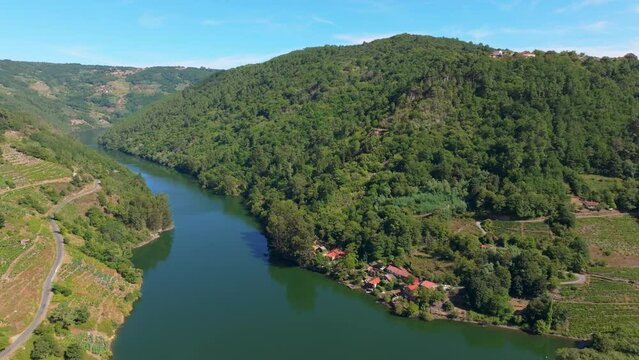 Coastal Village And Forested Mountains At Belesar In Lugo, Galicia, Spain. Aerial Drone Shot 