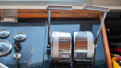 close up view of Naval engine, control lever.  Inside the captain's cabin. transportation and...