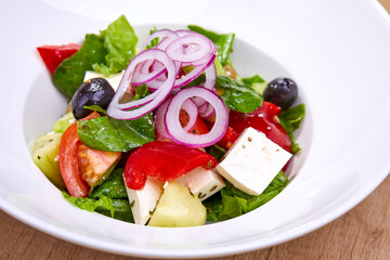 greek salad on the white plate
