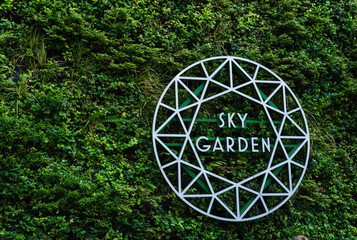 Sky Garden sign on the exterior of 20 Fenchurch Street, also known as the Fenchurch Building, or the Walkie Talkie building in London, UK.