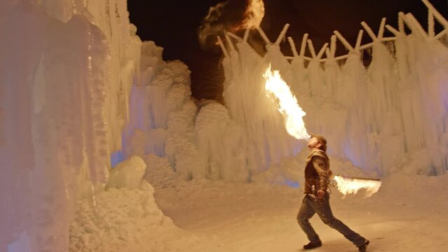 Swinging Around Flaming Sword And Spitting Fire In Winter Wonderland