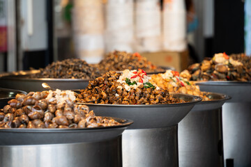 Spicy flavored snail meat, delicious street food in Taiwan. © RomixImage