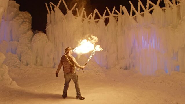 Fire Blowing With A Flaming Sword In Ice Palace - Wide, Cinematic Stunt