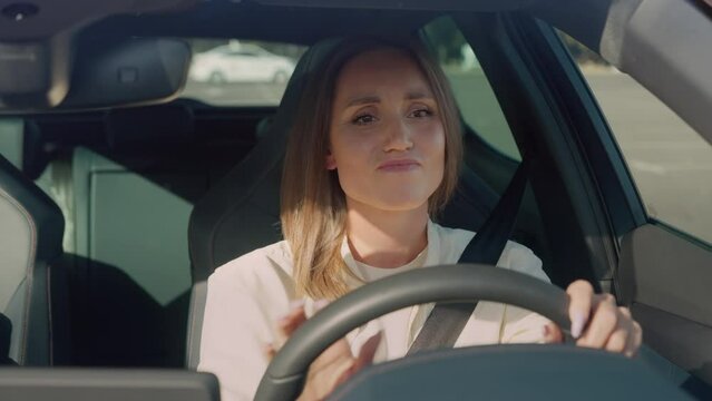Upset woman being late to work because of traffic jam